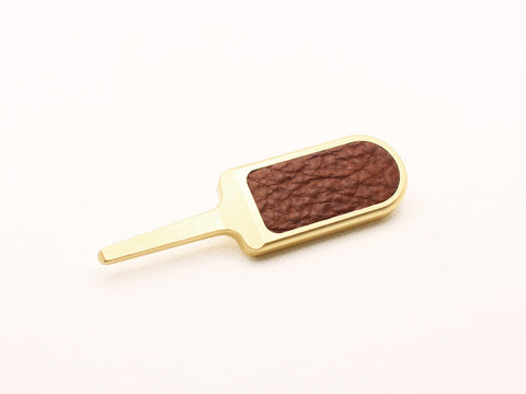 Golf divot tool leather inlay