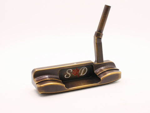 Slick putter with slant neck by Deschamps Designs Golf