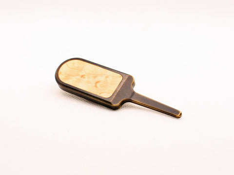 Milled divot tool with wood inlay