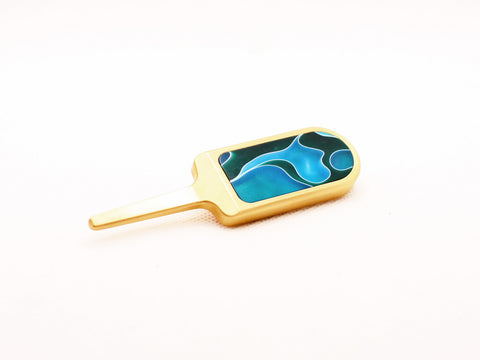 Milled divot tool with acetate inlay